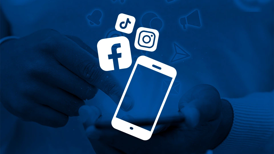 Social media icons over a cell phone representing
